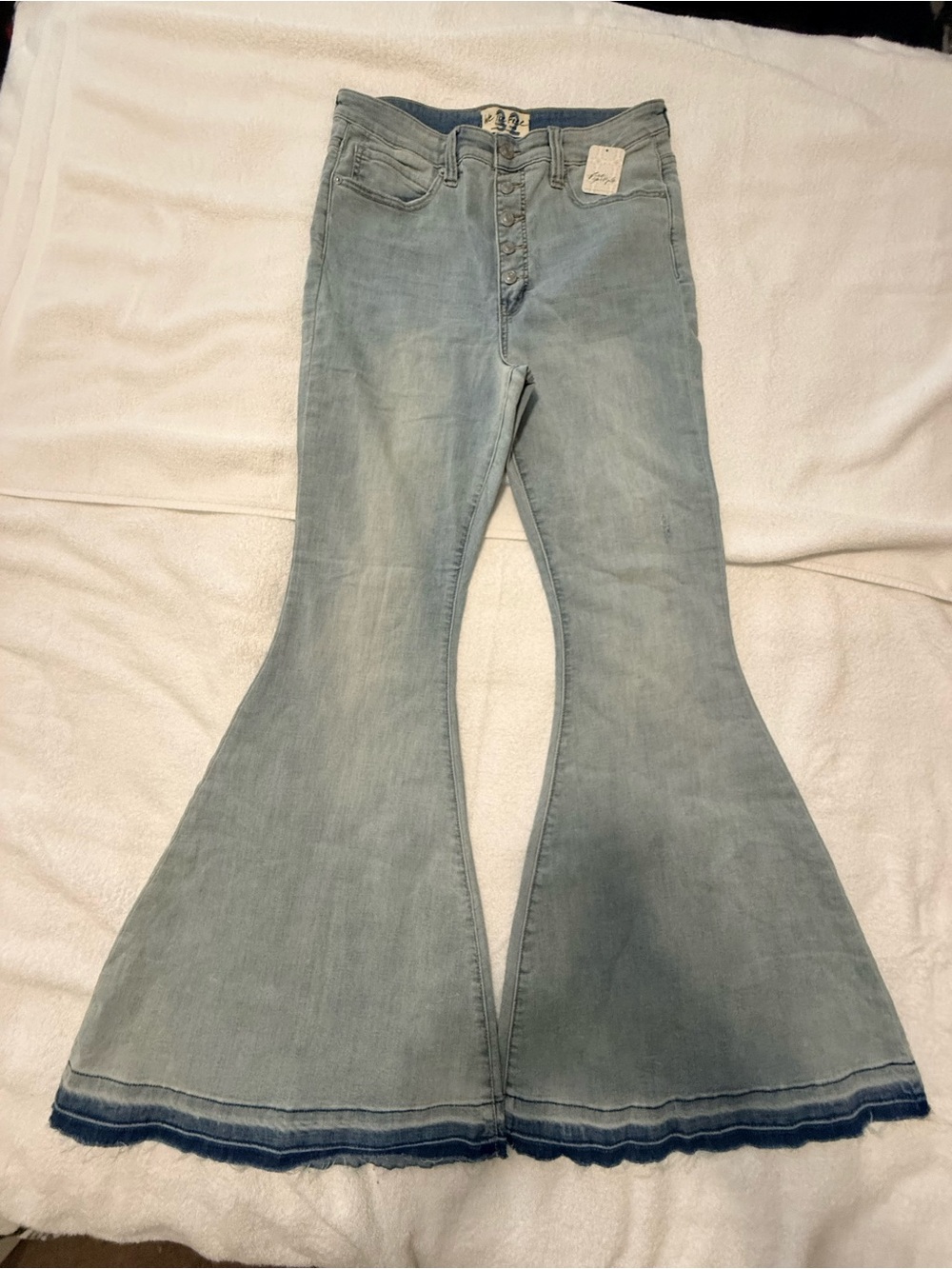 Size 32 NWT Free People Women’s button fly, super flare Jeans